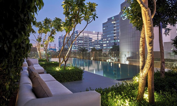 Thigalarapalya Hotel | Elegant The Den Bengaluru: 5-Star Stay with Spa & Pool