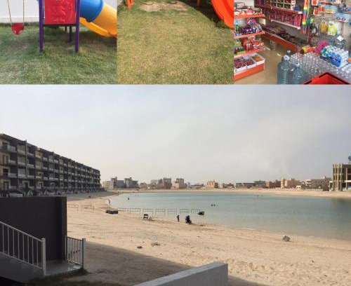 Al Khiran Apartment | Family Retreat at The Diamonds: Oceanfront & Poolside Bliss