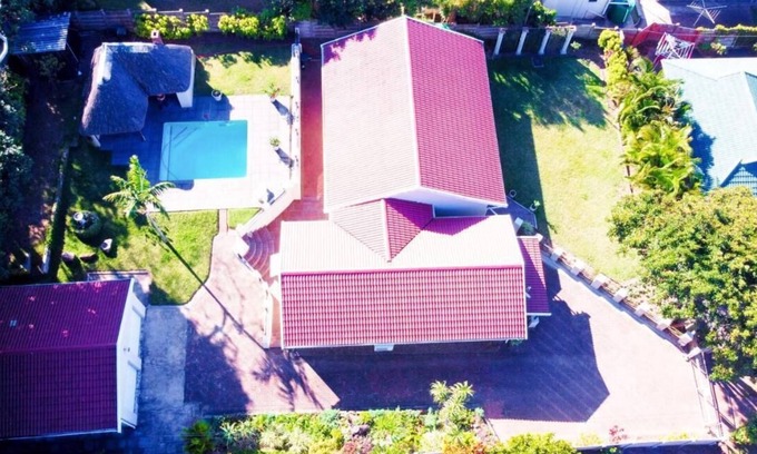 Scottburgh House | Experience The Donga House: Family-Friendly Retreat by the Beach