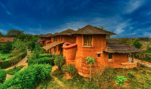Sawai Madhopur Hotel | Discover The Earth at Ranthambore: 4-Star Retreat with Pool