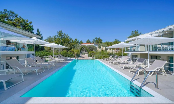 Potos Hotel | Elegant Apartments: Guest Rated 9.8 with Pool & Family Fun