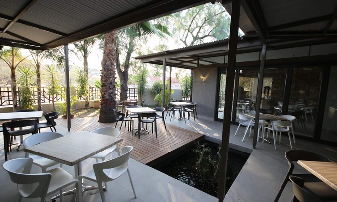 Windhoek House | Elegant Guesthouse: Family-Friendly Stay with Pool & Dining