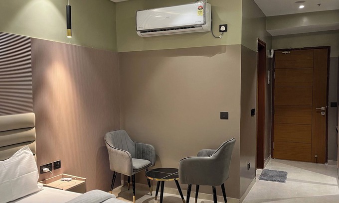Mohangarh Apartment | The Elite Luxe;Escape to our elegant hotel room in Lucknow.
