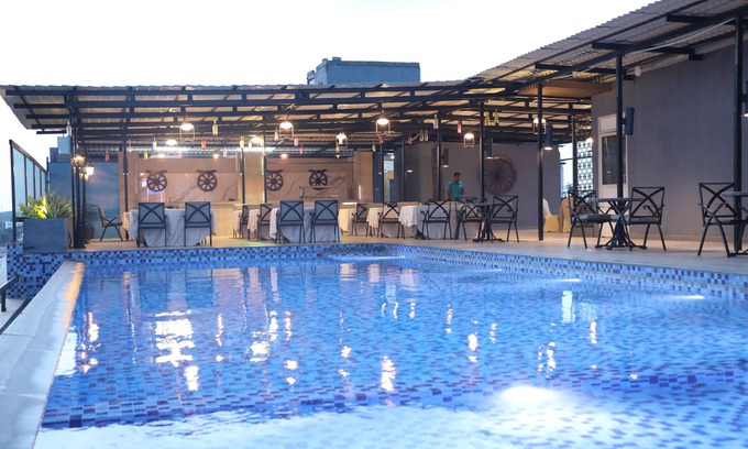 Kolar Hotel | Discover The Elite Narasapura with Pool and Family Amenities