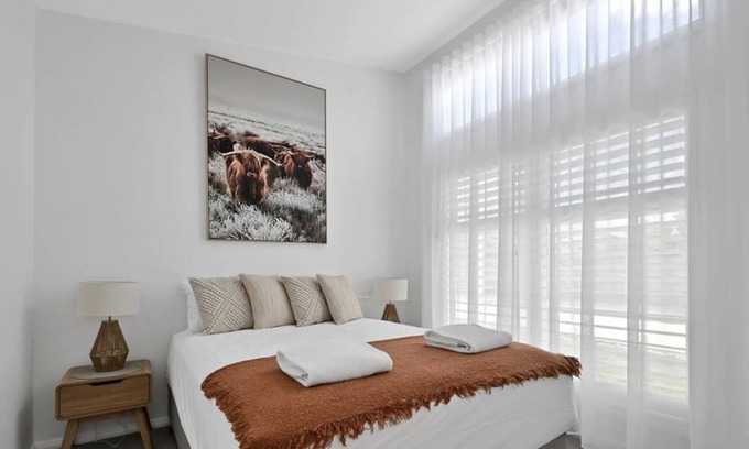 Orange Apartment | Discover The Elm Apartments: Family-Friendly Cowhide Room
