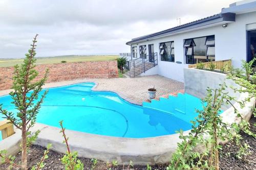 Cannon Rocks House | Experience The Farmstead: 4-Star Ocean View Getaway