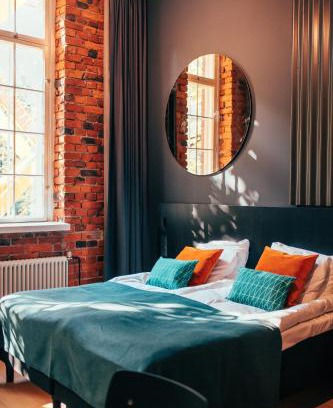Keskinen District Hotel | Experience The Folks Hotel Konepaja: Eco-Friendly Oasis