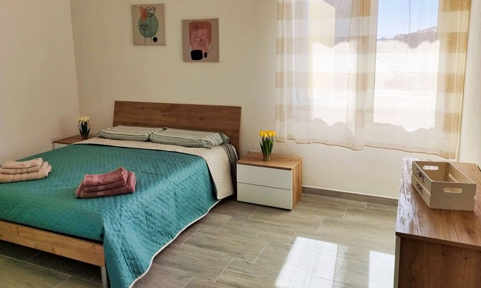 Assemini Apartment | Experience The Friend's House II: A Family-Friendly Retreat