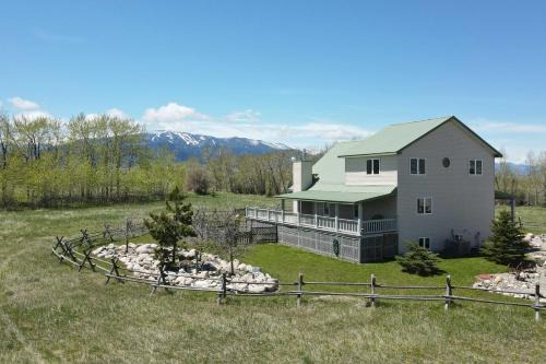 Red Lodge House | Indulge in The Front Porch: Country Home with Mountain Views