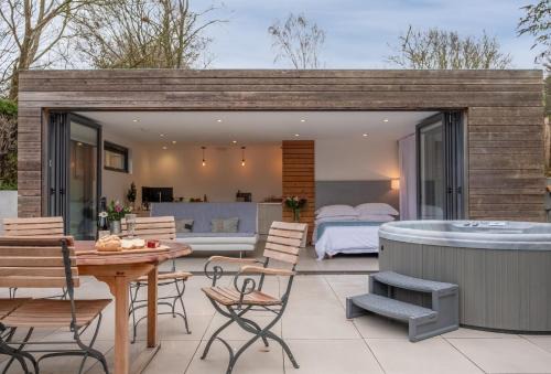 Plumpton Green House | Discover The Garden Room: Pet-Friendly Retreat Awaits