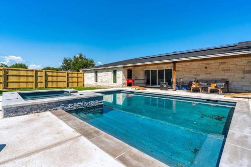 McNeil House | Discover The Gateway: 6-Bedroom Getaway with Pool & Game Room