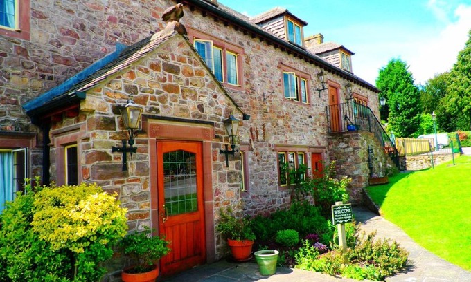 Aylburton Cabin | Experience The George Inn & Millingbrook Lodge Today!