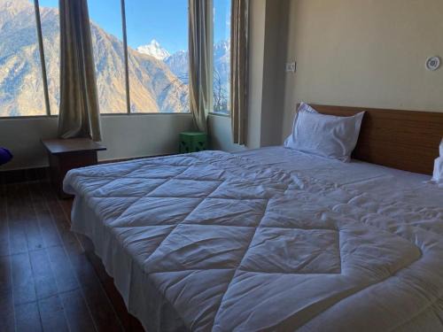 Auli House | Budget-Friendly Comfort at The Grand Apple - Pet Friendly Stay