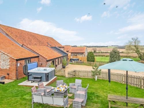 Gimingham House | Experience The Great South Barn: Pet-Friendly Getaway