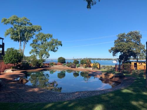 Bellara Apartment | Discover The Gums Anchorage: Oceanfront Oasis with Pool