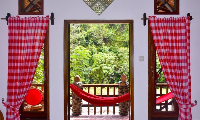 Bukit Lawang Hotel | EcoTravel Escape: Private Beach & Ocean View Awaits!