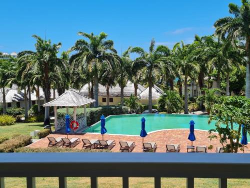 Freetown Apartment | Relax in The Hideaway Suite 1512 with Pool and Sea Views