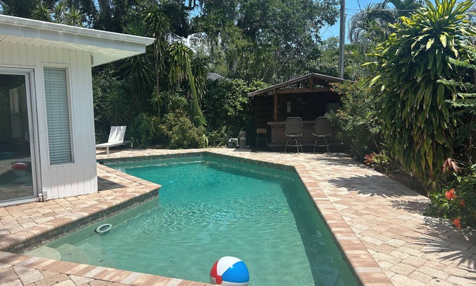 South Sarasota House | Relax at The Jungle Retreat: Poolside Family Fun Awaits