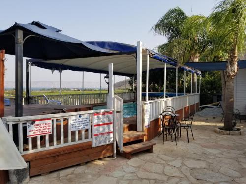 Migdal Ski Chalet | Experience The Lake House: Oceanfront Retreat with Pool