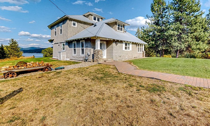 Loon Lake House | The Lakeside Farmhouse | Historic charmer with private dock & covered patio