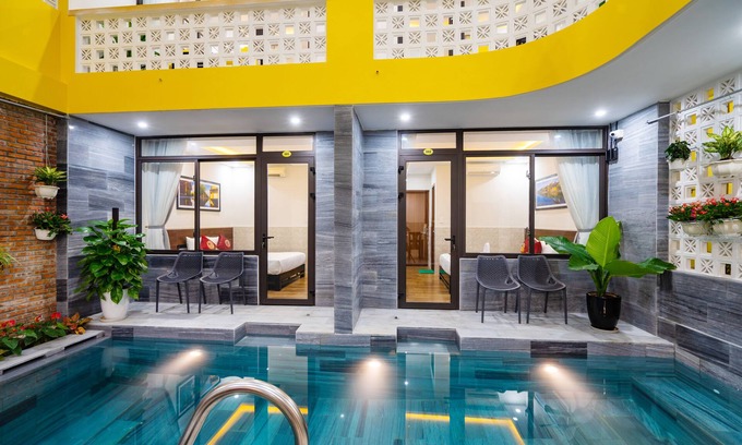 Minh An House | Explore The Lit Villa: Family-Friendly with Pool Access