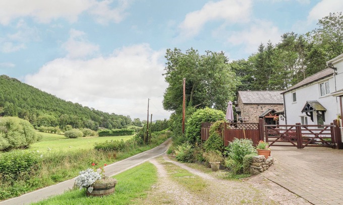Llanferres Cottage | Pet-Friendly Little White Cottage with Garden in Ruthin