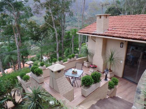 Teresopolis Cabin | Discover The Lodge: Oceanfront Retreat with Pool & Pets