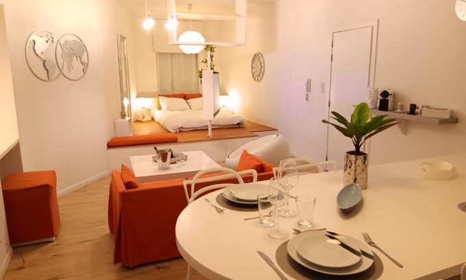 Jumet Apartment | Elegant White Suite with Hot Tub & Family-Friendly Amenities