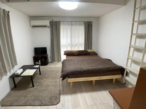 Minami-ku Apartment | Family-Friendly Stay at The Mickey Carlton Ohashi 107