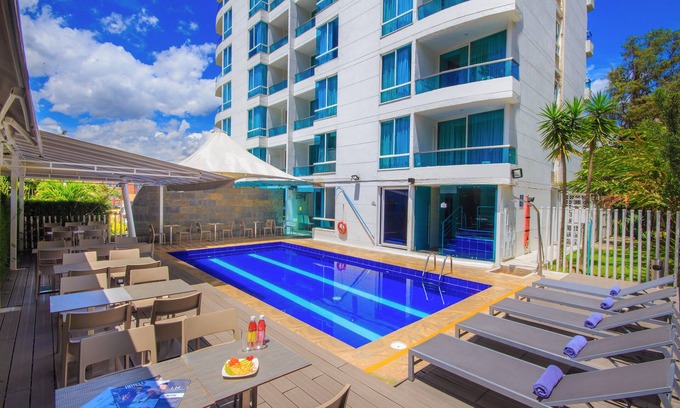 Buenos Aires Hotel | Unwind at The Morgana Poblado Suites Hotel with Pool & Spa