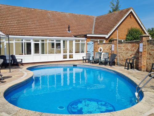 Aylsham House | Discover The Nest: 4-Star Getaway with Pool & Hot Tub