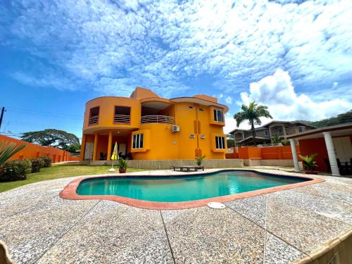 Port of Spain Bed & Breakfast | Discover The Nook at Pax Vale: Oceanfront Family Retreat