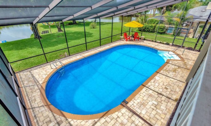 Lakeview Village House | Experience The Oak House: Waterfront Retreat with Heated Pool