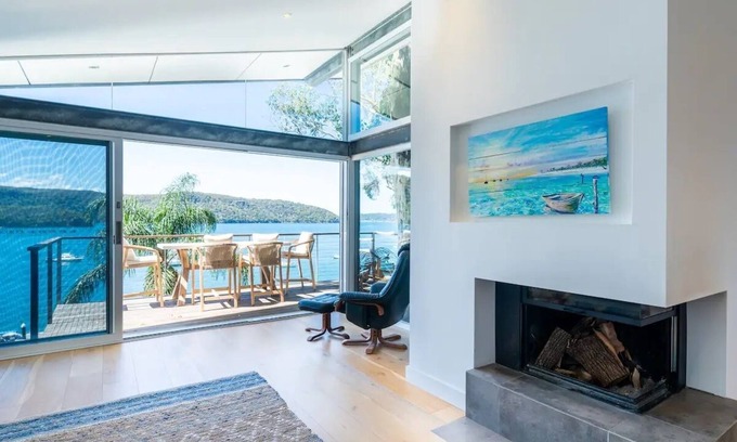 Scotland Island House | Elegant Oasis: Waterfront Retreat with Private Jetty