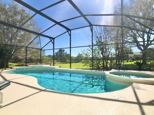 Orange Tree House | Experience The Oasis: Family-Friendly with Pool & Hot Tub