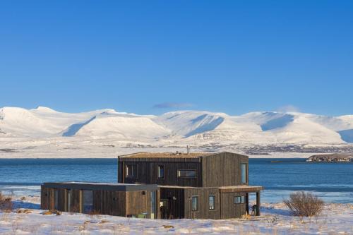 Kjosarhreppur House | Oceanfront Villa with Private Beach and Northern Lights Views