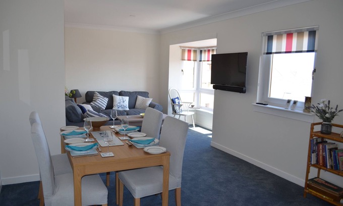 Dunbar Apartment | Unwind in the Old Harbor Master's Apartment with Ocean Views