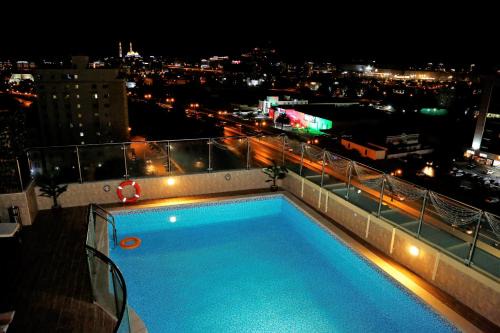 Al Ghubrah Ash Shamaliyyah Hotel | Discover The Palace Hotel: Spa & Family-Friendly Stays
