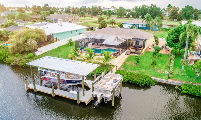 Apollo Beach House | Experience The Palm Tree Waterfront with Pool & Ocean Views