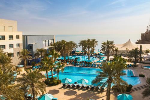 Salwa Resort | Experience The Palms Beach Hotel & Spa: Oceanfront Serenity
