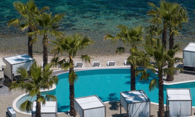Tkon Villa | Discover The Palms Resort - Duplex Villa Beach III Retreat