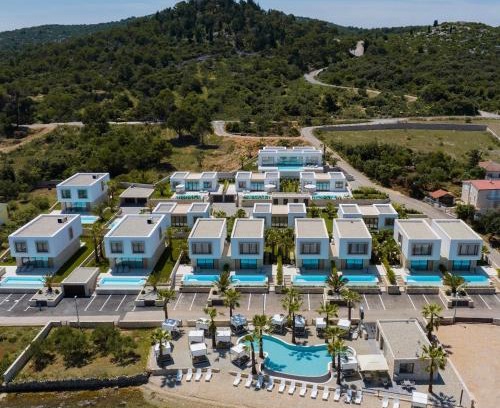 Kraj Villa | Oceanfront Getaway at The Palms Resort - Guest Rated 9.8