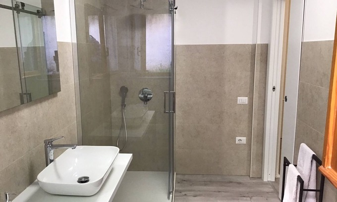Santa Giusta Apartment | Comfortable Stay at The Park with Family-Friendly Amenities