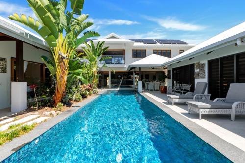 Trinity Beach House | The Peony Isle - Luxe Lakeside Haven with Pool & Spa