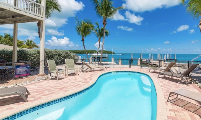 Marathon House | Oceanfront Retreat with Private Elevator and Heat Pool
