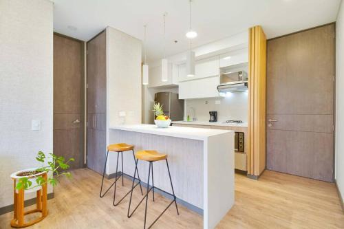 El Poblado Apartment | Ideal Getaway in Medellín with Pool and Pet-Friendly Perks