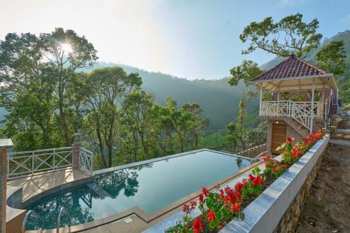 Suryanelli Resort | Discover The Planet Munnar: Family-Friendly Retreat with Pool