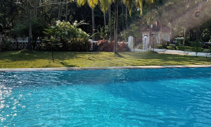 Velsao Hotel | Experience The Postcard Cuelim with Pool & Dining Options