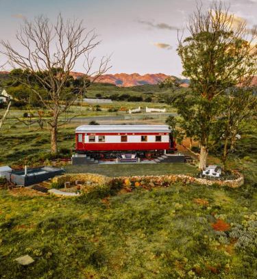 McGregor Villa | Experience The Red Caboose Train Carriage with Pool & Hot Tub