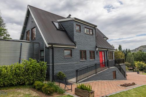 Clarens House | Experience The Red Door: 4-Star Hotel with Top Amenities